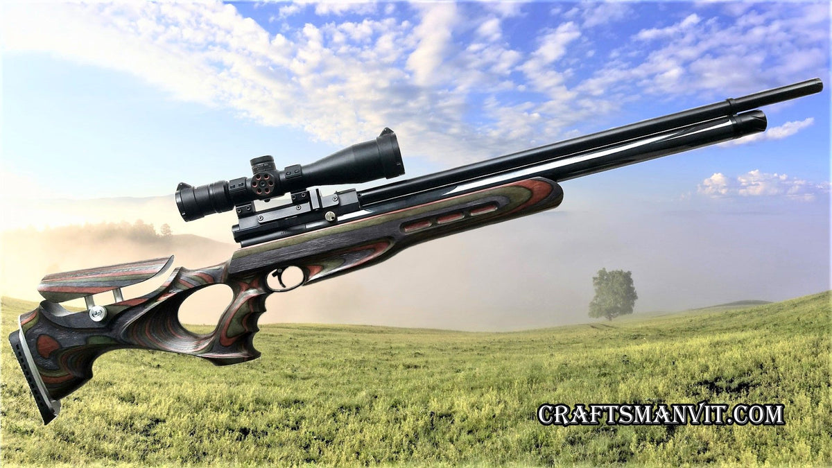 Air Arms S400 & S500 series custom stock with a scope in Forest Camo design against a scenic background.