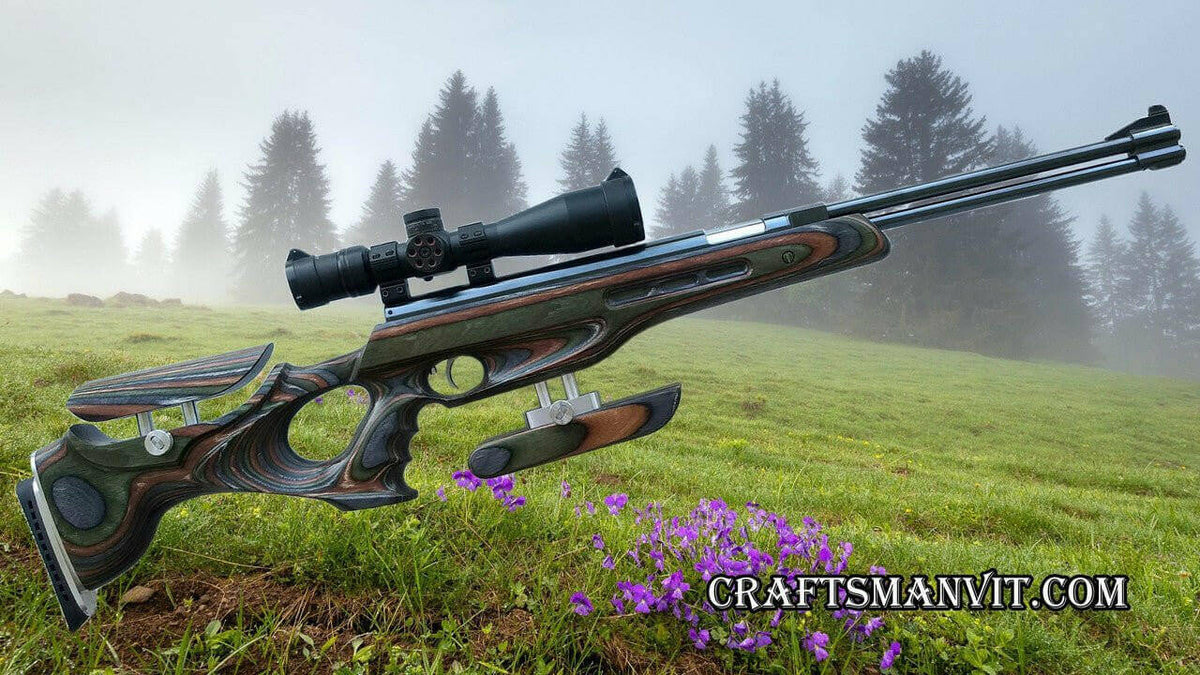 Weihrauch HW77 HW97 custom stock in forest camo, designed for FT/HFT competitions, displayed in a misty outdoor setting.